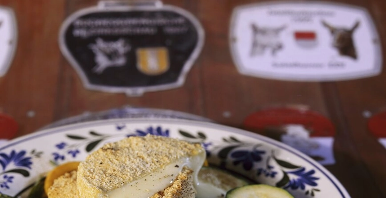 Tommes panées sur lit de courgettes bio